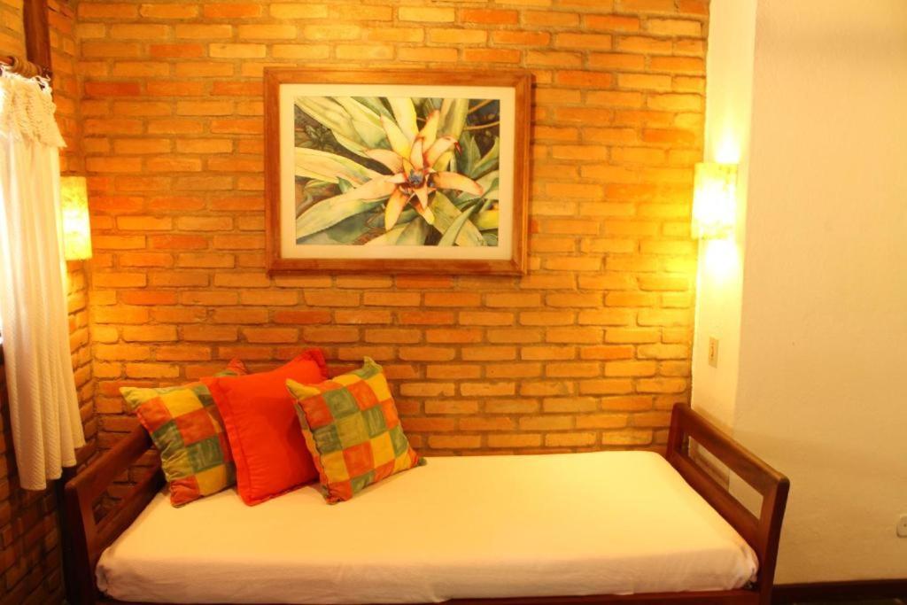 Quarto Triplo com Vista para a Piscina